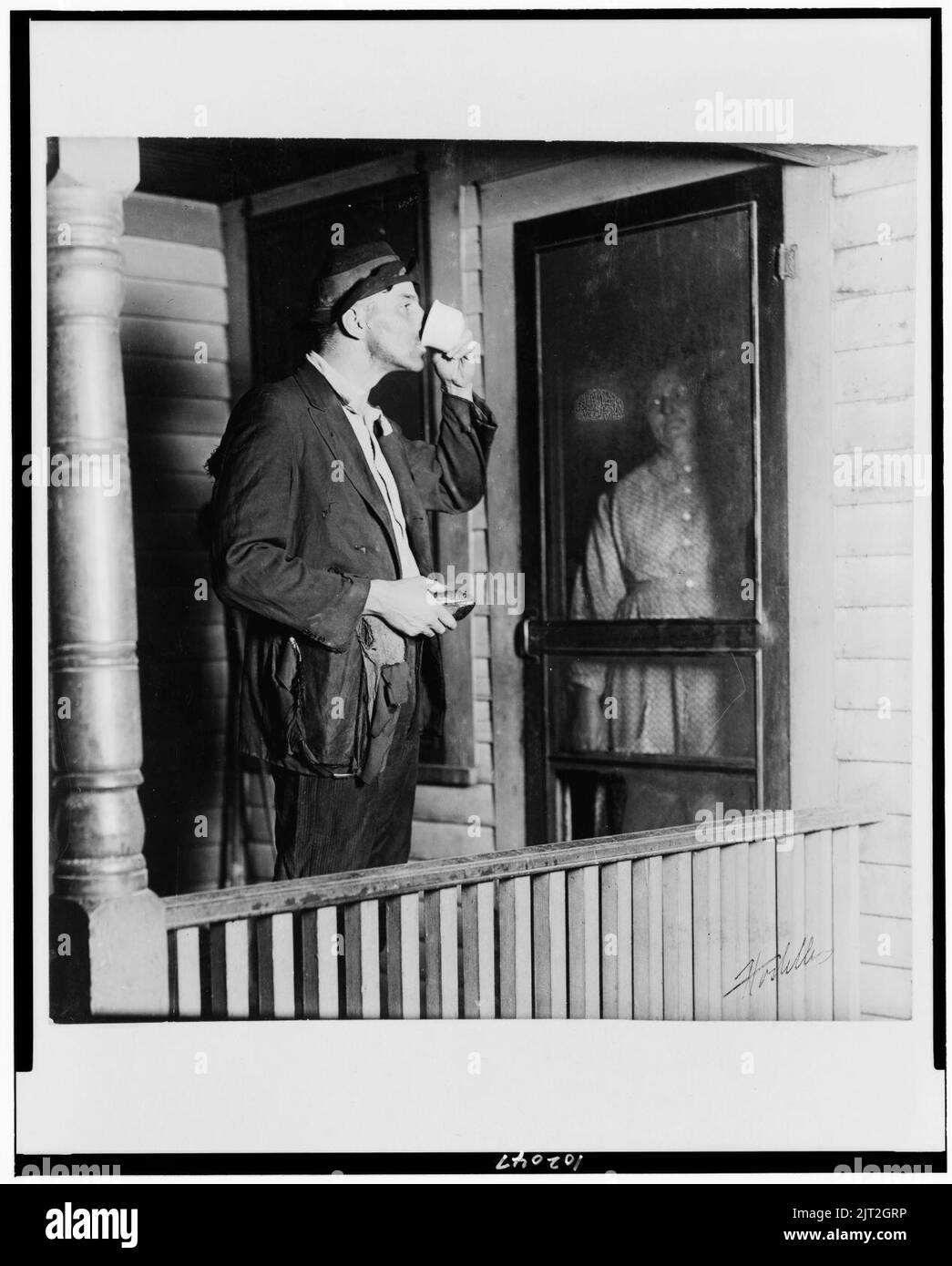 Vagabondo elemosinando cibo Foto Stock