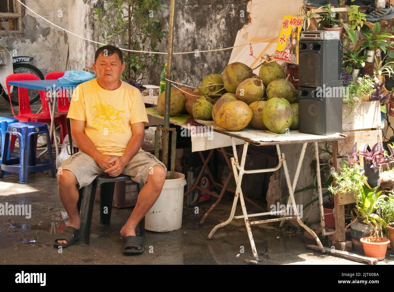 Venditore di cocco, George Town, Penang, Malesia, Asia Foto Stock