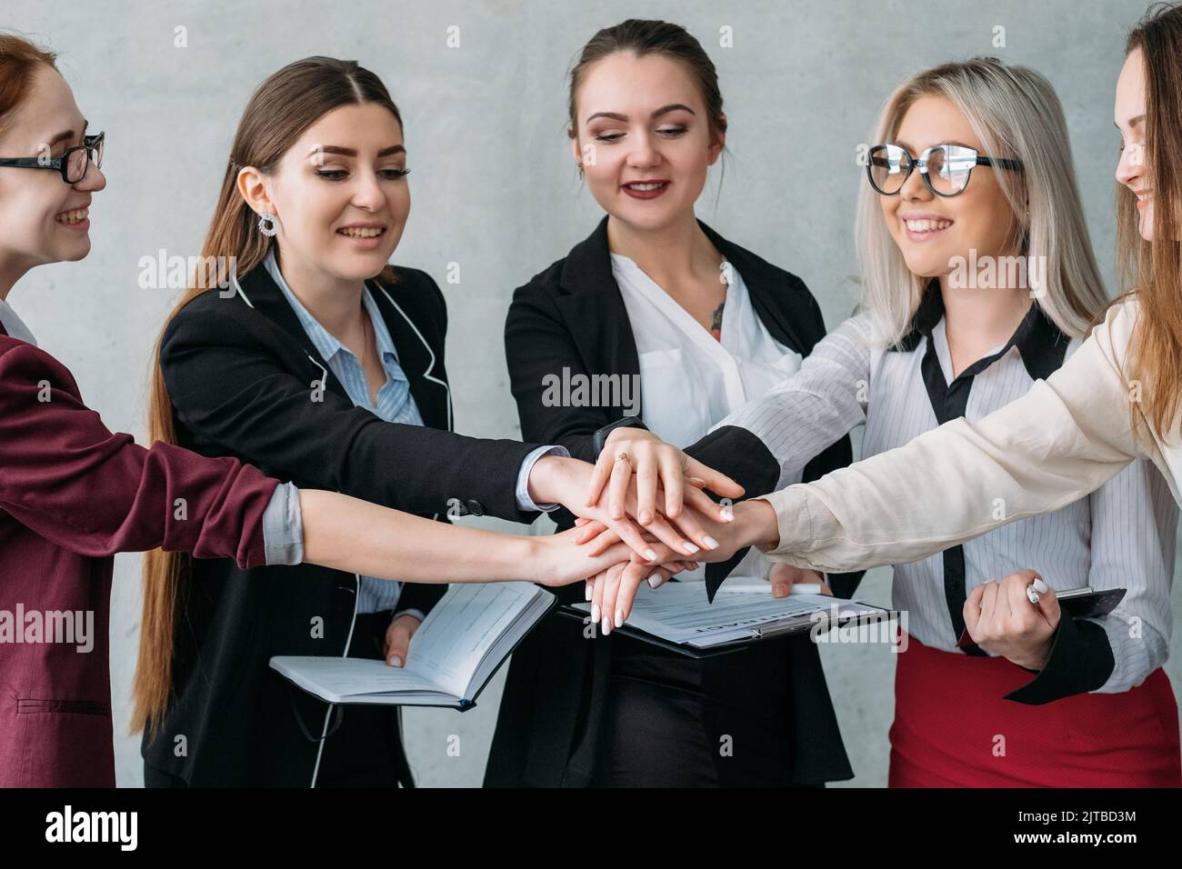 corporate marketing team donne unità cooperazione Foto Stock