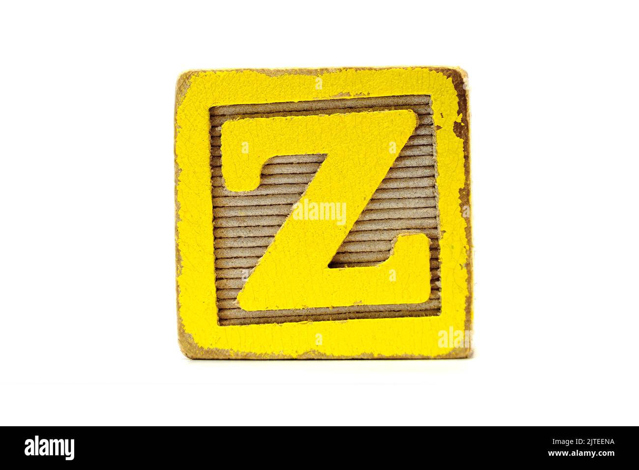 Stressato legno giallo blocco giocattolo, lettera Z. giocattolo di sviluppo educativo del bambino Foto Stock