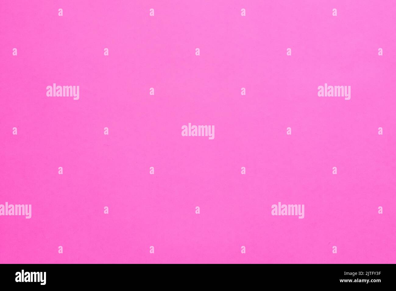 spazio copia su sfondo a tinta unita rosa brillante Foto Stock