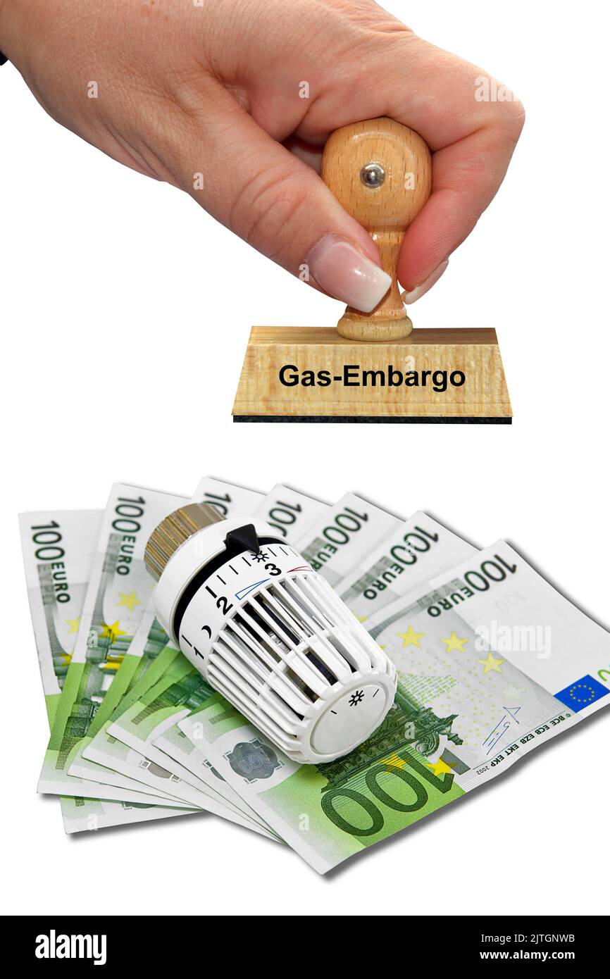 termostato di riscaldamento, banconote e francobollo 'gas embargo', aumento dei costi di riscaldamento Foto Stock