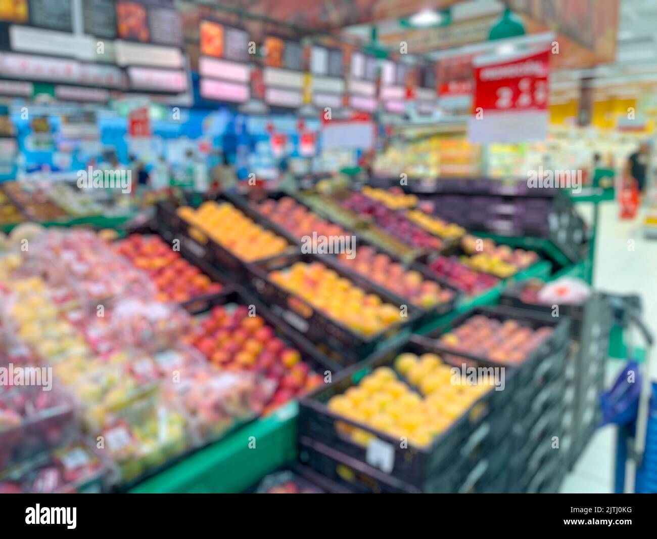Astratto sfocato supermercato navate frutta per sfondo. - foto di scorta Foto Stock