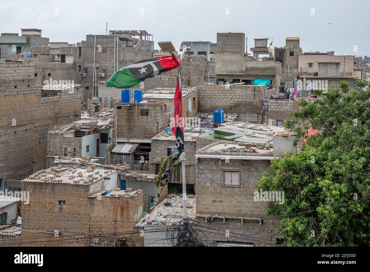 Karachi Korangi strade e mezzi pubblici e biciclette Foto Stock