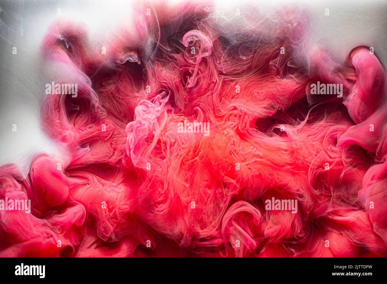inchiostro acqua burst fantasy fumo magenta astratto nebbia Foto Stock