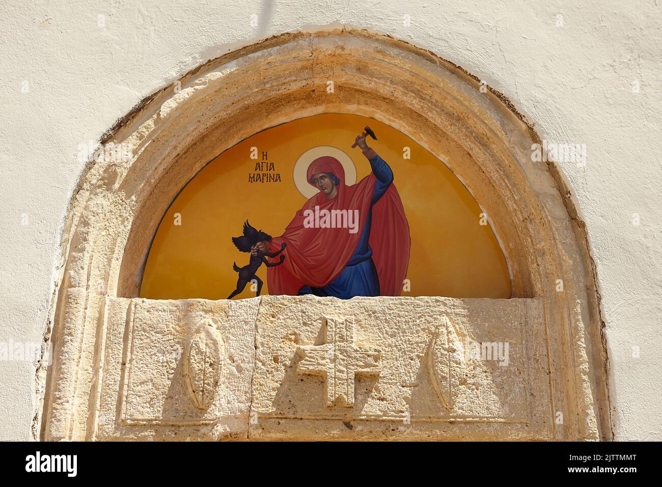 Saint Marina, icona ortodossa greca che mostra Saint Marina colpire il diavolo Foto Stock