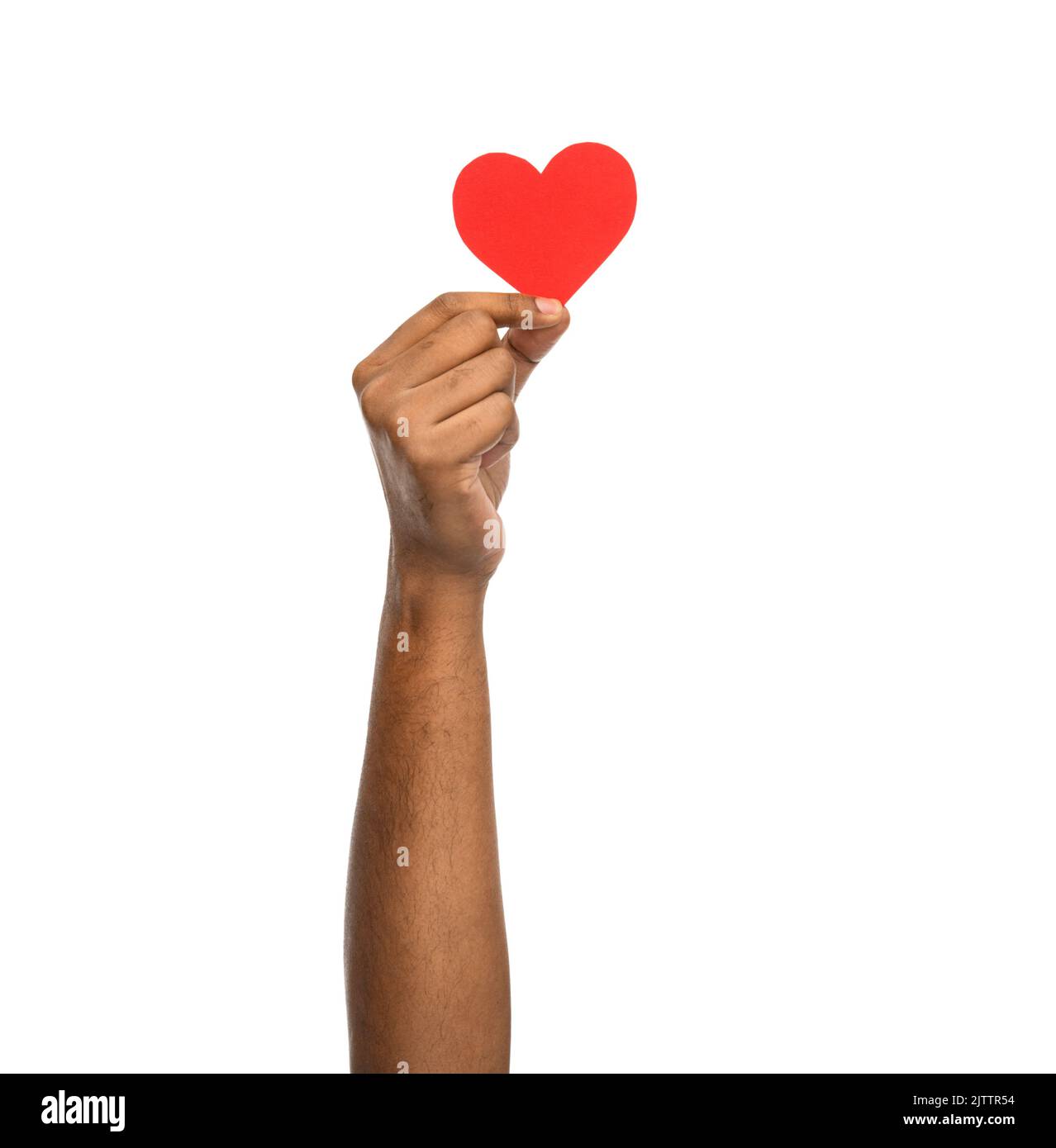 primo piano della mano che tiene il cuore rosso Foto Stock