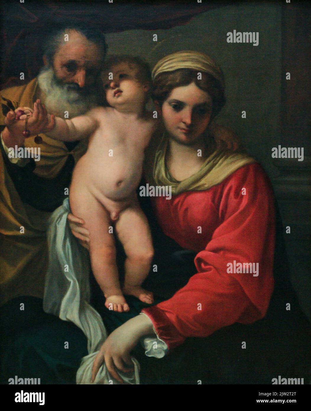 La Madonna delle ciliegie è un dipinto del 1515 di Tiziano, influenzato da opera di Giovanni Bellini. Originariamente olio su legno, fu poi trasferito a. Foto Stock