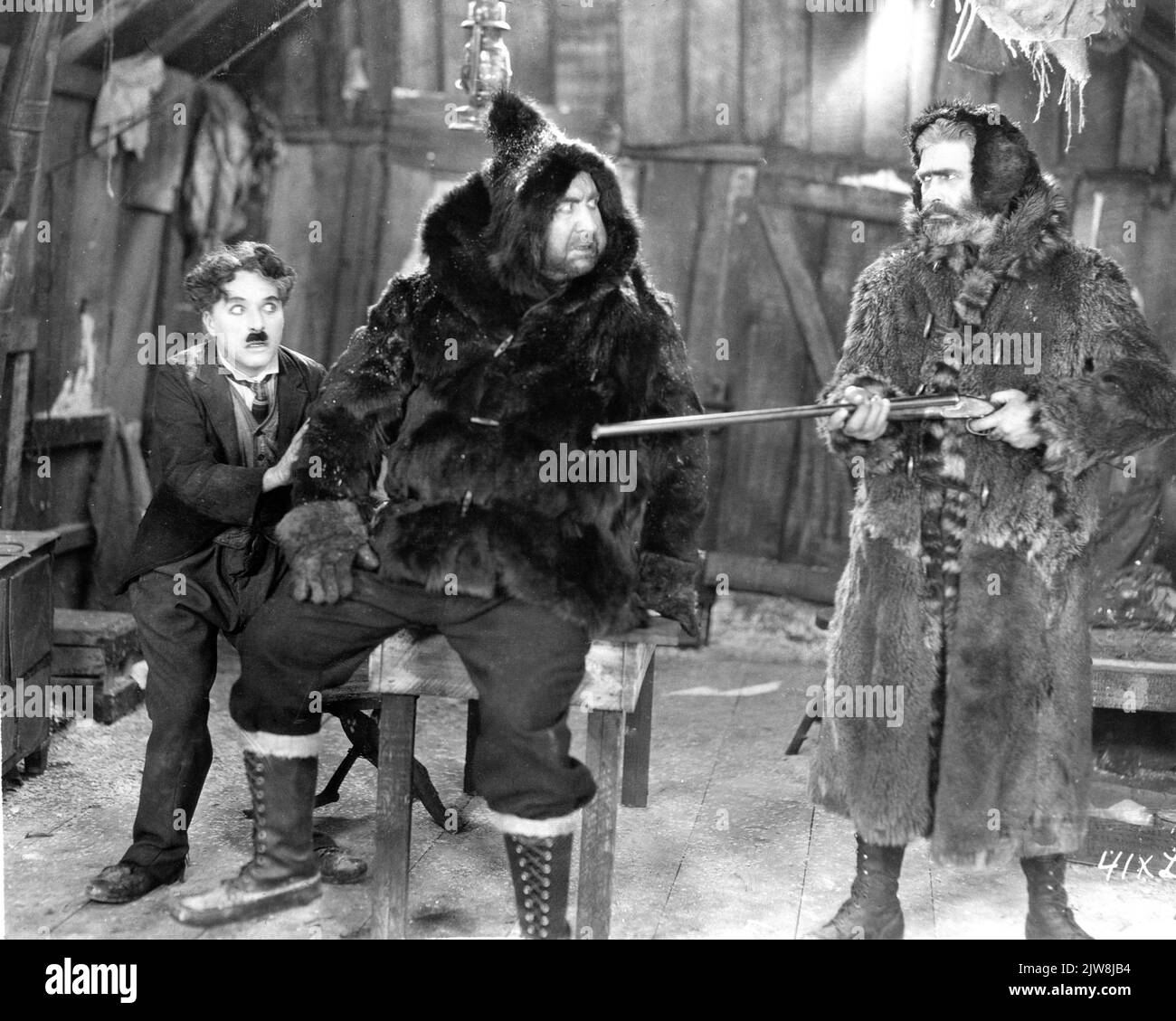 CHARLIE CHAPLIN MACK SWAIN e TOM MURRAY in THE GOLD RUSH 1925 regista / scrittore CHARLES CHAPLIN Charles Chaplin Productions / Artisti Uniti Foto Stock