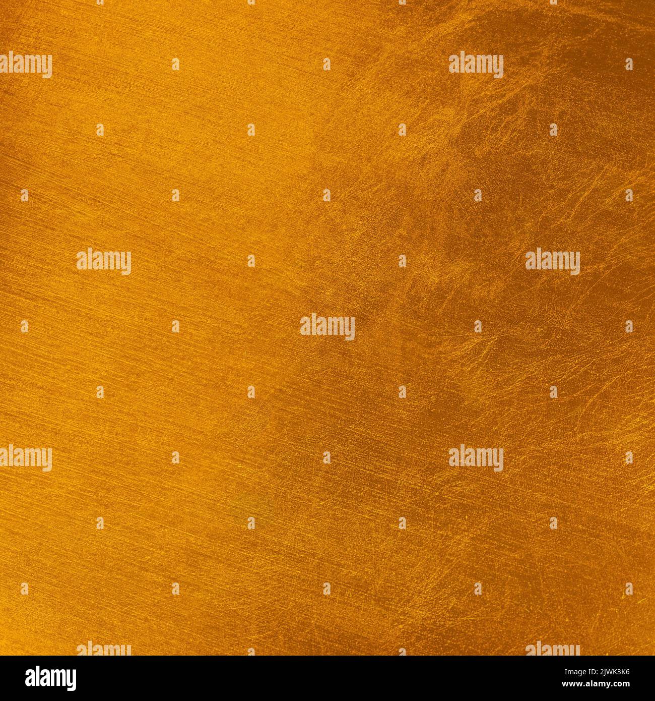 Colore dorato per sfondo natalizio. Macchie allungate, superficie ruvida e ruvida. Sfondo di Natale utile Foto Stock
