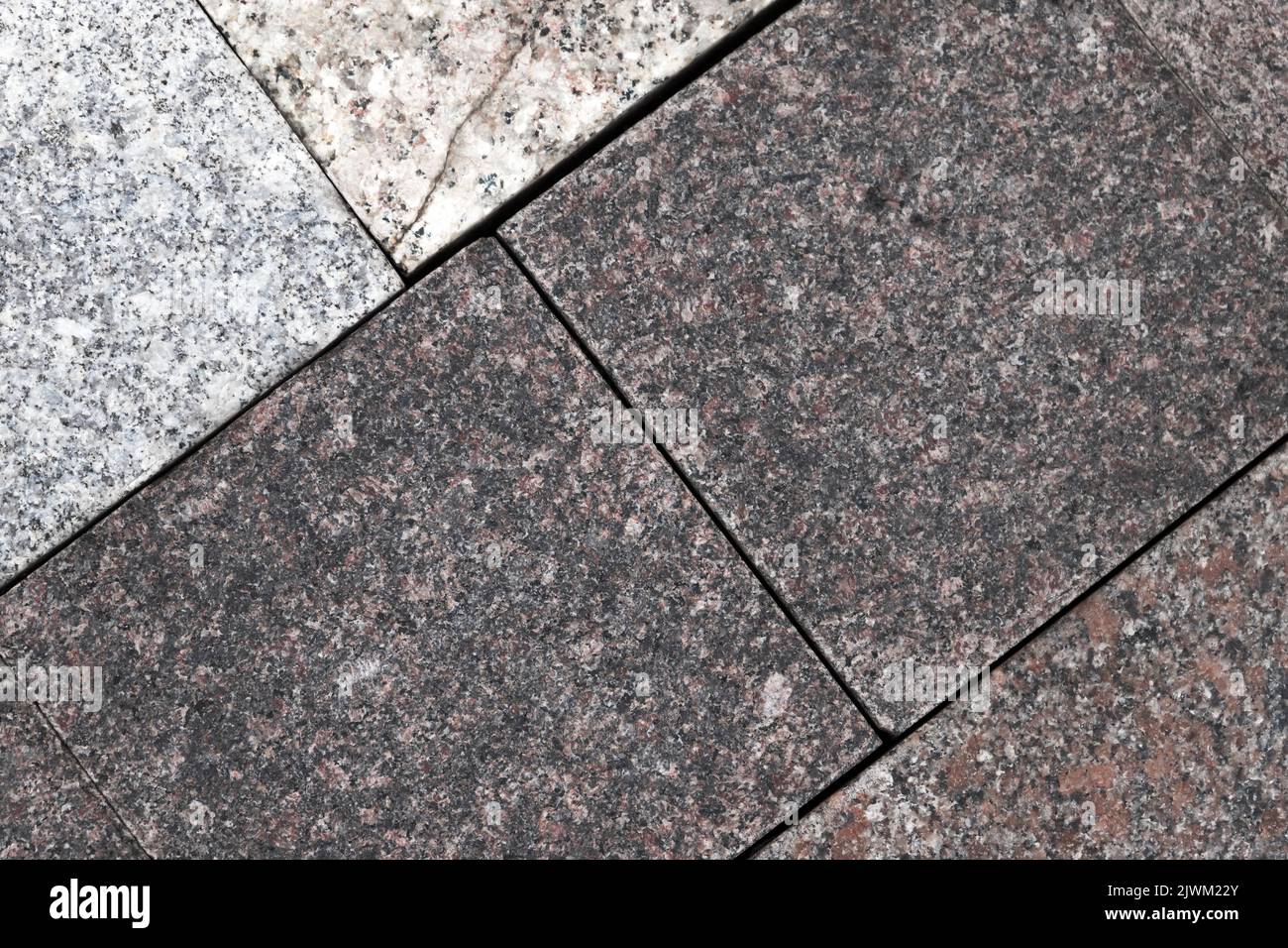 Pavimento in piastrelle di granito, vista dall'alto, texture foto di sfondo Foto Stock