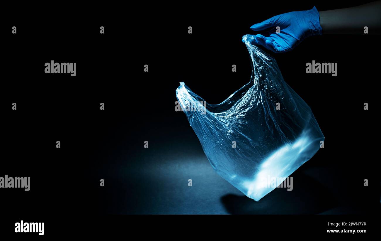 raccolta rifiuti plastica inquinamento sacco usato mano Foto Stock