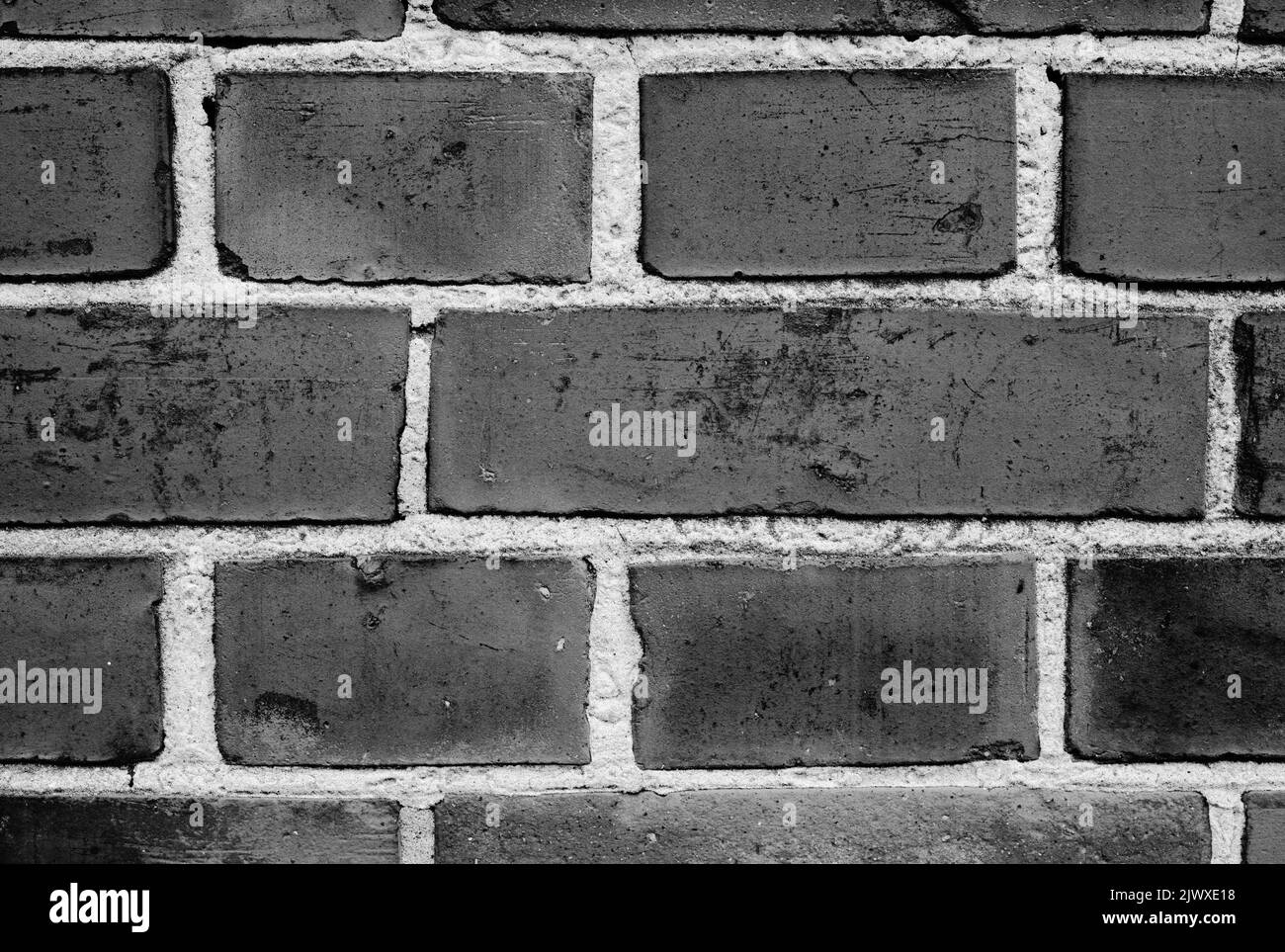 Tenere le cose dentro e tenere le cose fuori. Un muro di facebrick. Foto Stock