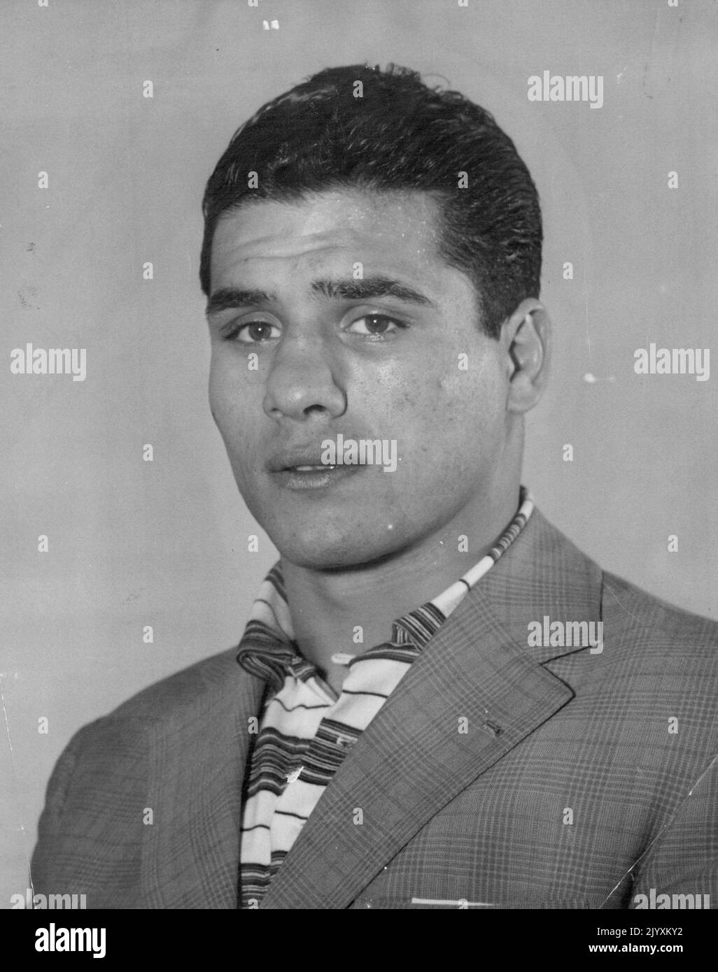 Boxer italiano Italo Scortichini che è arrivato ieri per le lotte nella Città Bianca. Incontrerà George Barnes. Marzo 25, 1955. Foto Stock