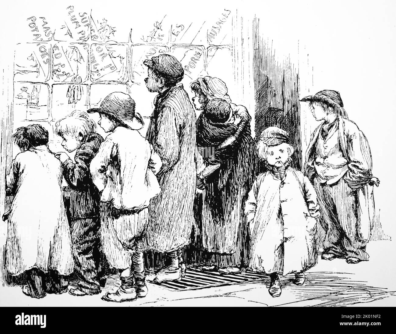 I bambini poveri di Londra starring a lungo nella finestra di un negozio di cibo cucinato. Foto Stock