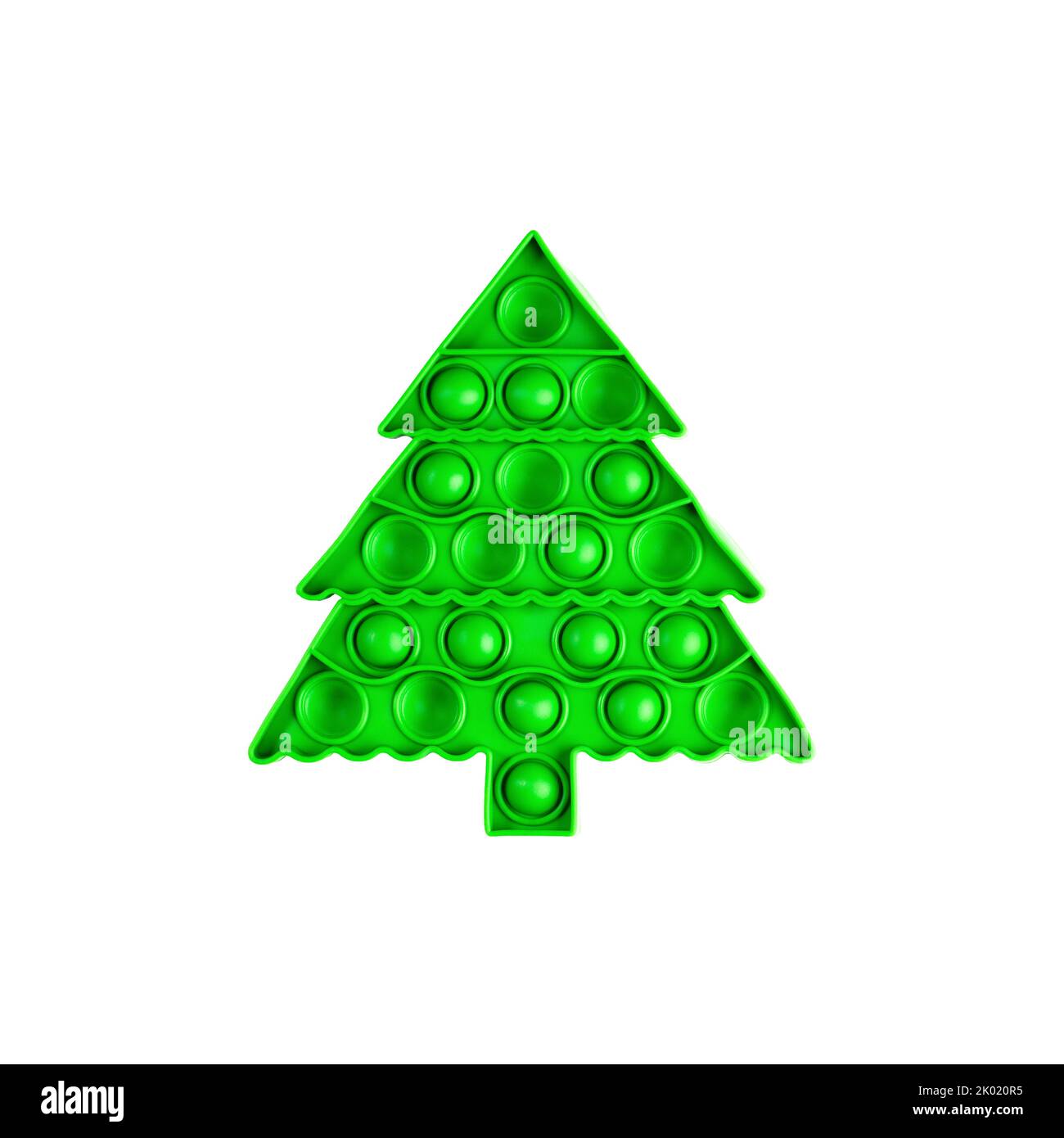Un bambino popolare trendy anti lo schiocco di sforzo esso giocattolo sotto forma di albero verde di Natale isolato su fondo bianco. Carta natalizia minima per i bambini. Foto Stock