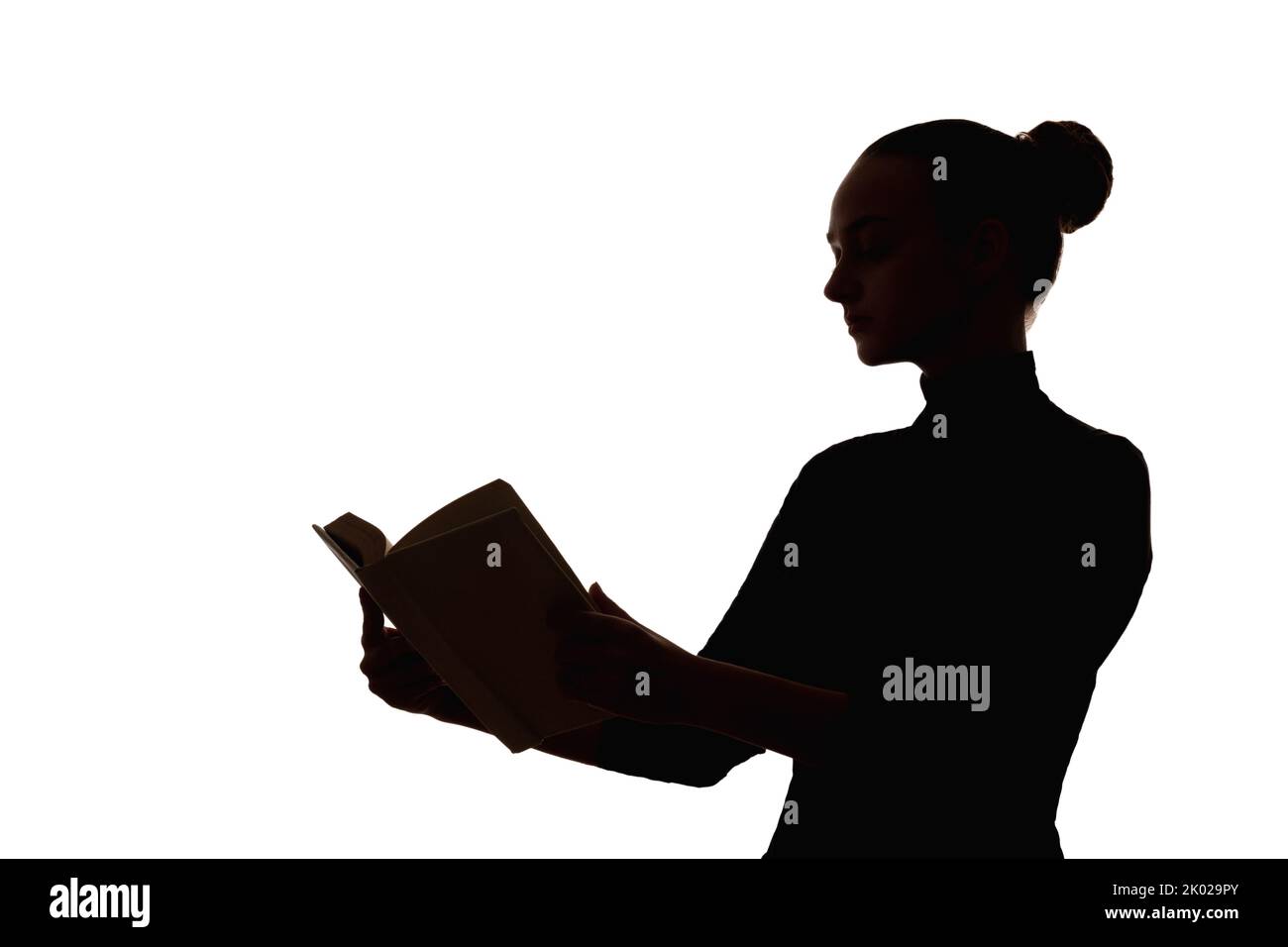 donna intelligente silhouette lettura hobby libro aperto Foto Stock