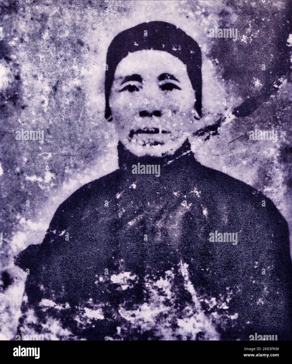 La madre di Ren Bishi, Zhu Shi, nacque nel 1877 e morì nel 1938. Era una donna frulla, semplice e saggia. Ren Bishi era un leader militare e politico nel primo Partito comunista cinese. Nei primi anni '1930s, Foto Stock