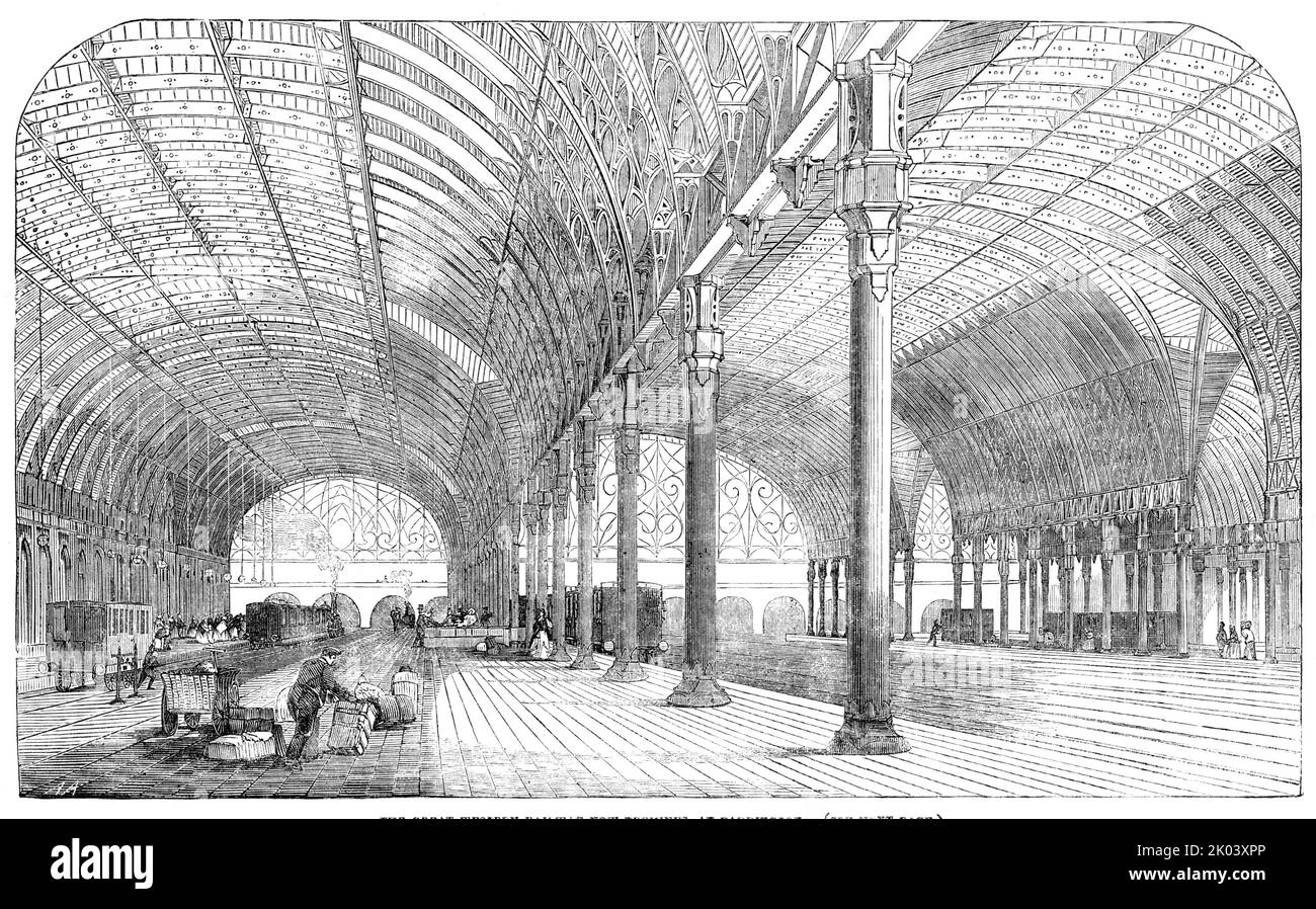 The Great Western Railway New Terminus, a Paddington, 1854. Stazione di Paddington a Londra di recente apertura: 'E' il lavoro congiunto di MR [Isambard Kingdom] Brunel e MR. [Matthew Digby] Wyatt: La prima ha organizzato il piano generale, e la parte ingegneristica e commerciale; la seconda i dettagli architettonici in ogni reparto...il tetto contiene 189 costole in ferro battuto, O archi, di forma ellittica, disposti in file di tre ciascuno, paralleli tra loro, con dodici nervature diagonali in corrispondenza dei transetti... la metà centrale di ciascuno dei tetti curvi è smaltata, e l'altra parte Foto Stock