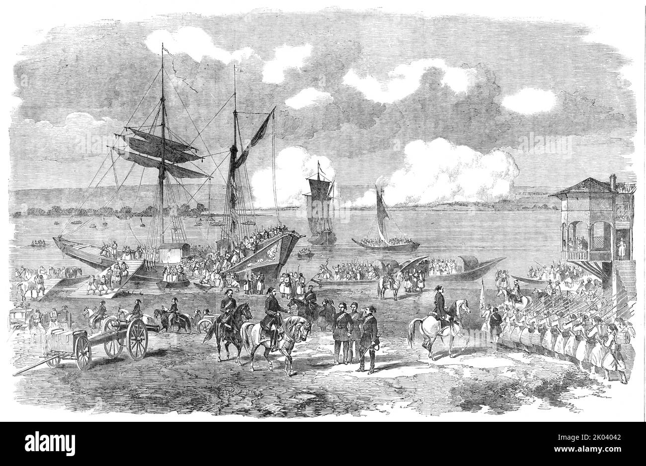 Oltenitza, da Turtukai - da un disegno originale, 1854. Guerra di Crimea. Il maresciallo ottomano e il governatore Omar Pasha supervisionano l'artiglieria e le attrezzature che vengono caricate sulle navi. Le città di Oltenita e Tutrakan in Romania si trovano sui lati opposti del Danubio. 'Illustration...from un disegno colorato realizzato dal maggiore Dixon, dal quale è stato portato obbligatoriamente dal Conte di Carlisle come regalo a Lord Dudley Coutts Stuart, M.P.; che ha gentilmente messo a nostra disposizione questa interessante immagine. In primo piano si trova Omer Pachaa'. Da "Illustrated London News", 1854. Foto Stock