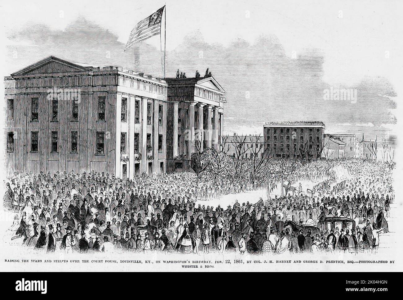 Elevando le stelle e le strisce sopra la casa di corte, Louisville, Kentucky, il compleanno di Washington, 22nd febbraio, 1861, del colonnello J. H. Harney e di George D. Prentice. Illustrazione del 19th° secolo dal quotidiano illustrato di Frank Leslie Foto Stock