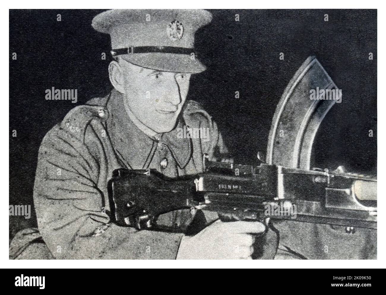 Un pistolero di Bren durante la seconda guerra mondiale La pistola Bren era una serie di mitragliatrici leggere (LMG) prodotte dalla Gran Bretagna negli anni '1930s e utilizzate in vari ruoli fino al 1992. Foto Stock