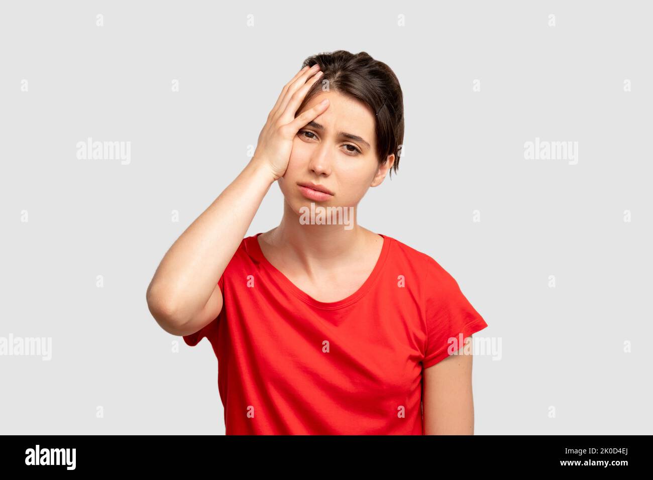 donna esausta ritratto mal di testa frustrazione Foto Stock