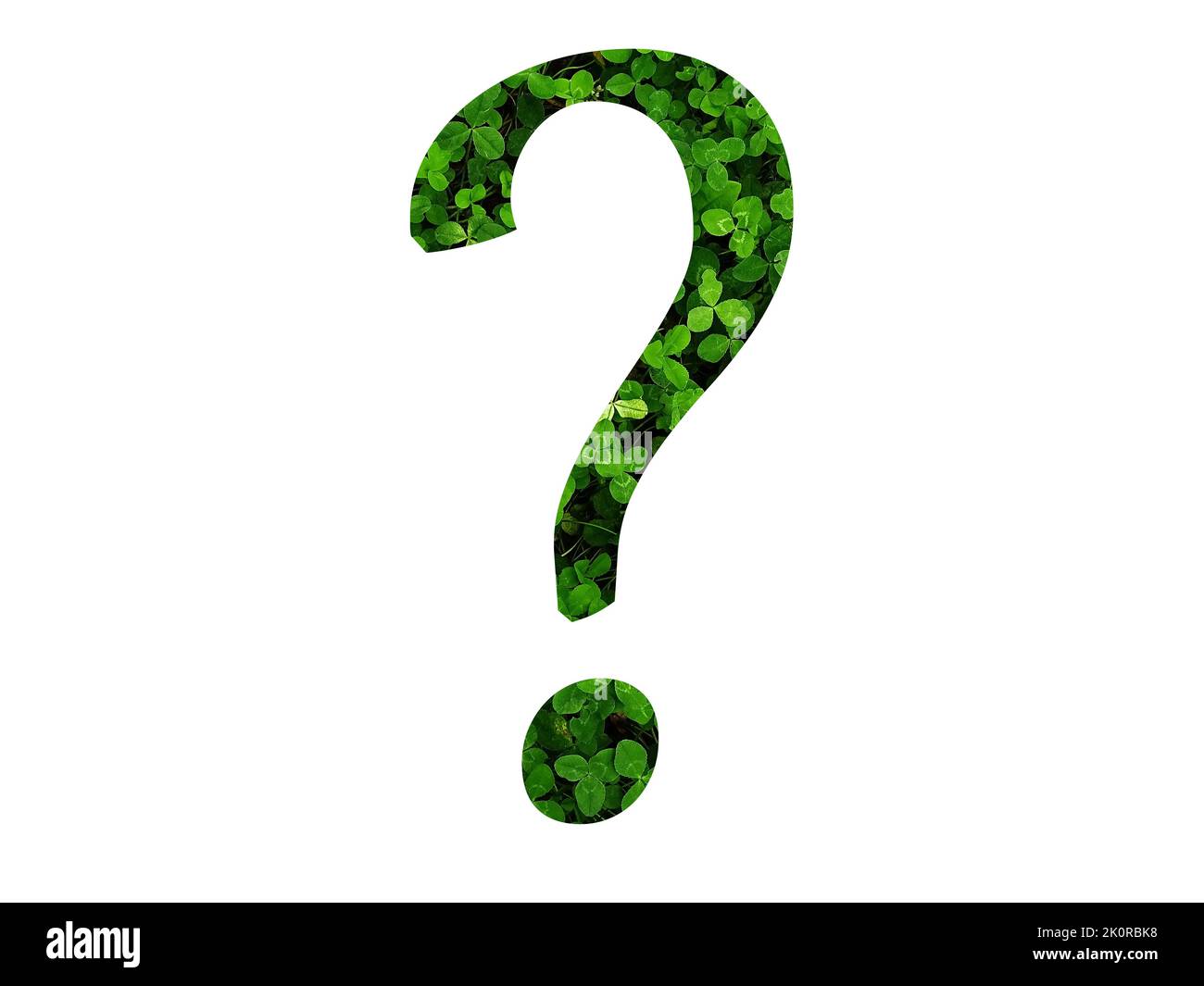 punto interrogativo dell'alfabeto fatto con foglia verde di un campo di trifoglio. fatto con colore verde Foto Stock