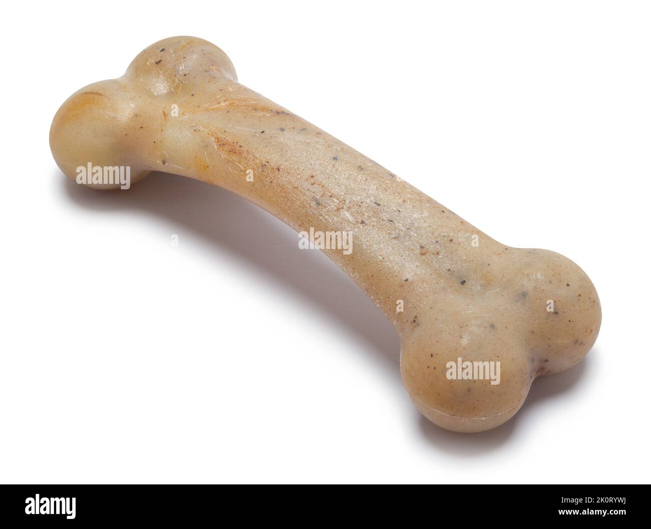 Plastica Dog Bone Cut out su bianco. Foto Stock
