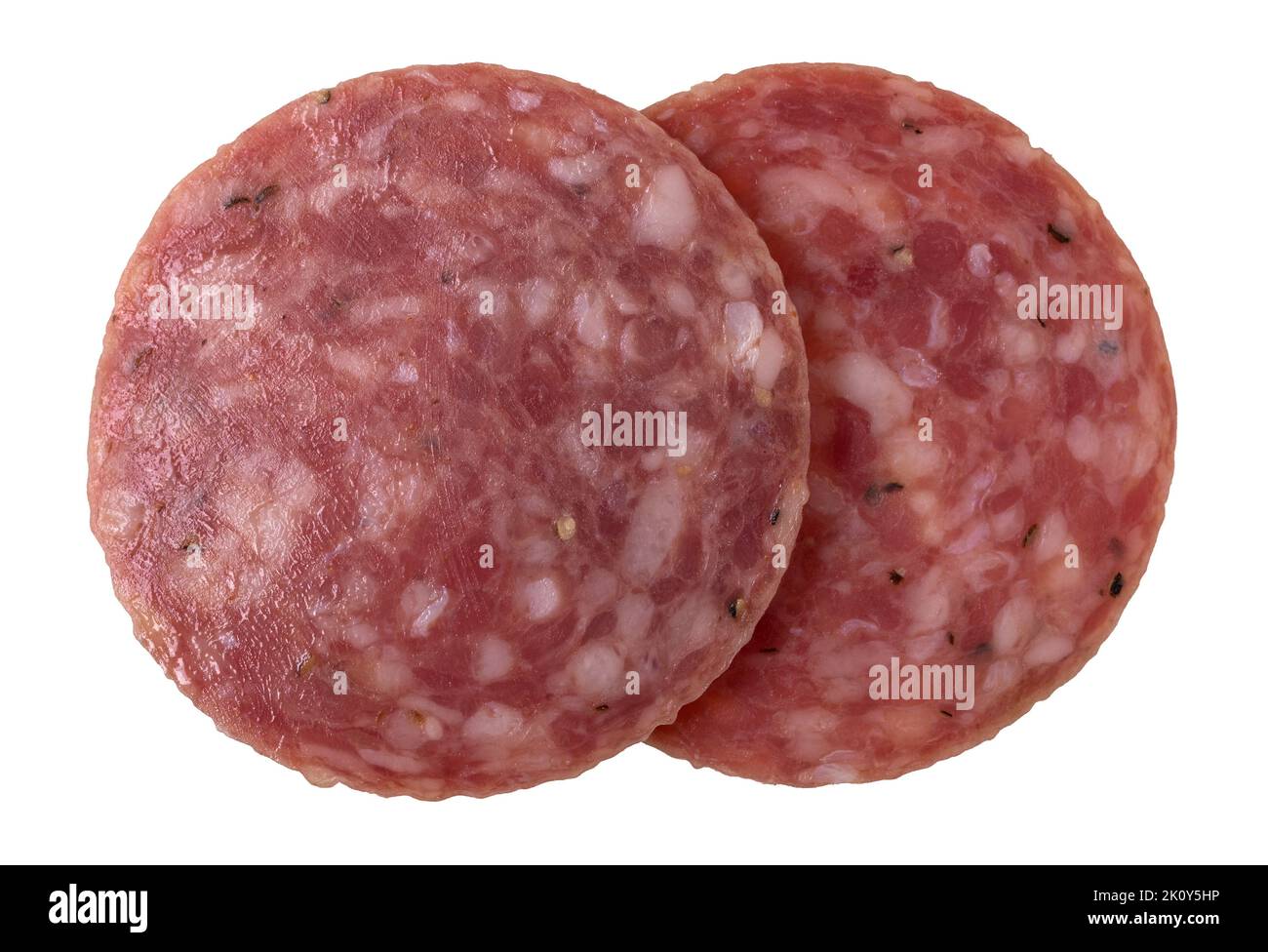 Vista dall'alto di due fette di salame secco isolate su sfondo bianco. Foto Stock