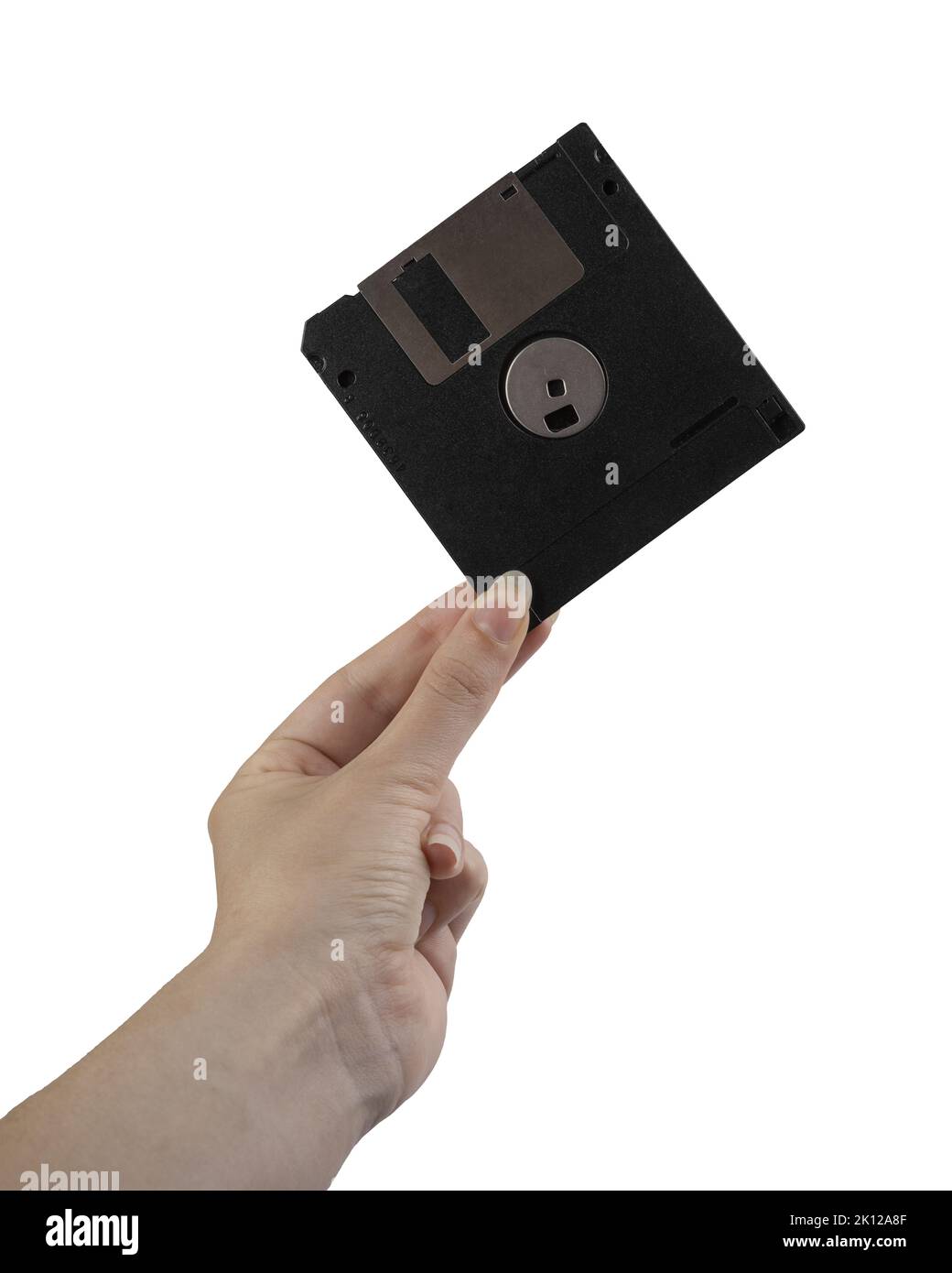 un vecchio floppy disk nella mano femmina su sfondo bianco Foto Stock