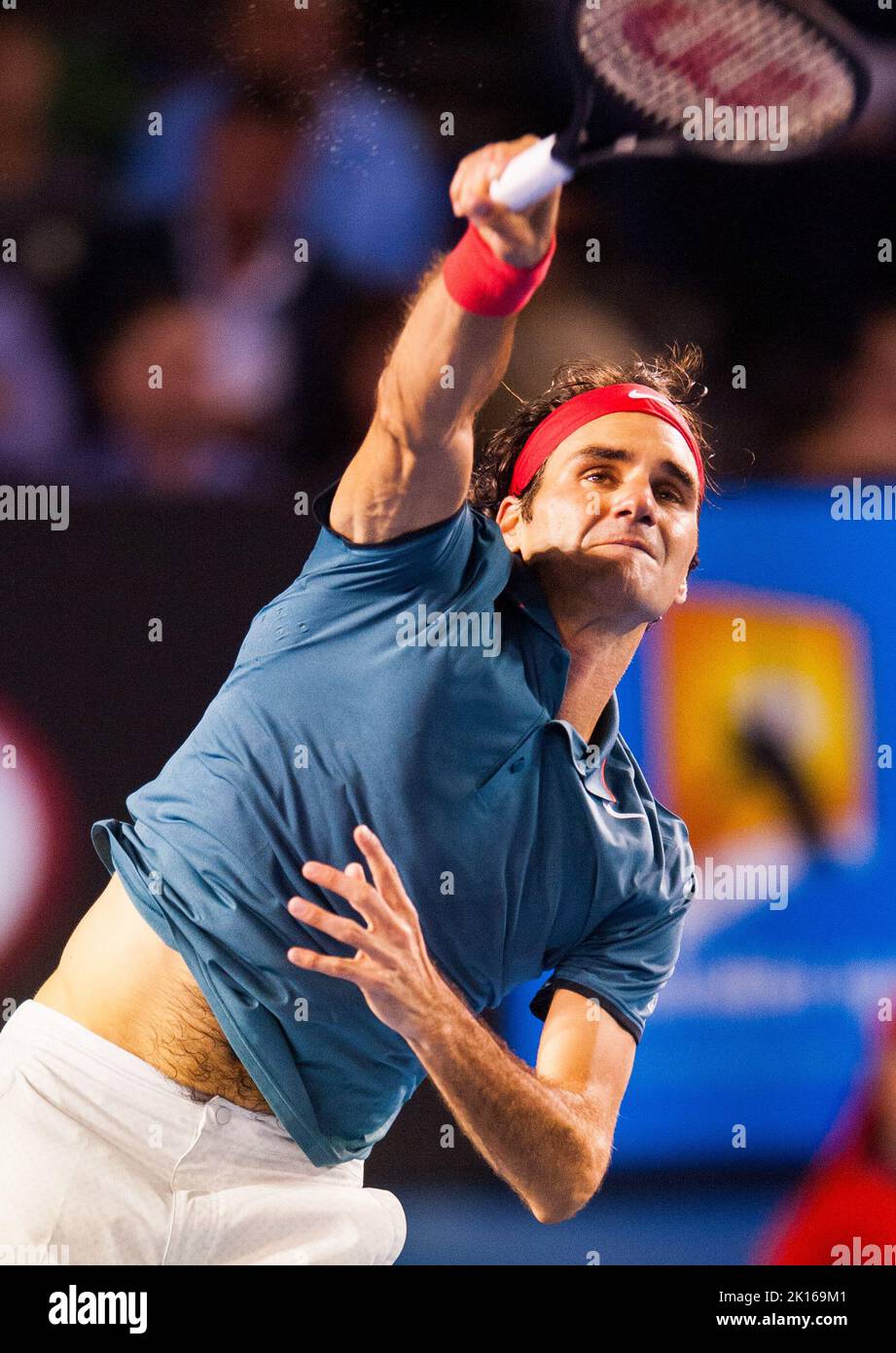 Roger Federer (sui) ha affrontato J.W. Tonga (fra) nel quarto round dell'Australian Open Men's Singles 2014. Fatturati come una partita di rancore, Federer si è facilmente spostato nei quarti di finale dove incontrerà Andy Murray GBR). Federer batte Tonga 6-3, 7-5, 6-4. Foto Stock