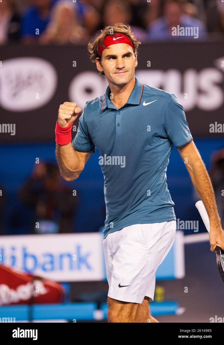 Roger Federer (sui) ha affrontato J.W. Tonga (fra) nel quarto round dell'Australian Open Men's Singles 2014. Fatturati come una partita di rancore, Federer si è facilmente spostato nei quarti di finale dove incontrerà Andy Murray GBR). Federer batte Tonga 6-3, 7-5, 6-4. Foto Stock