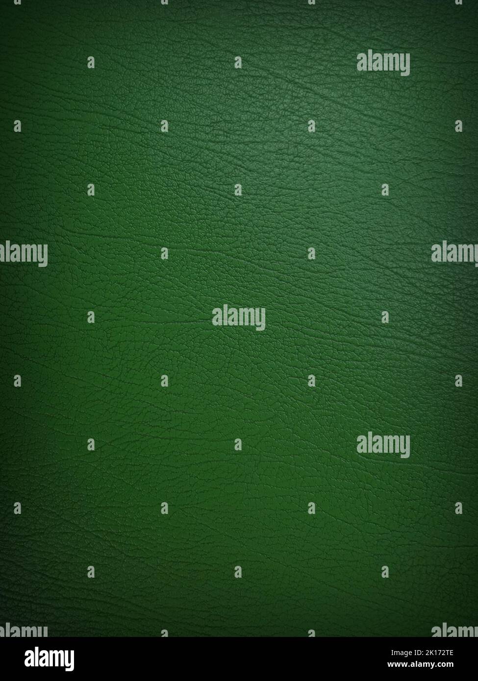bellissima superficie di rivestimento del divano in pelle, pelle verde Foto Stock