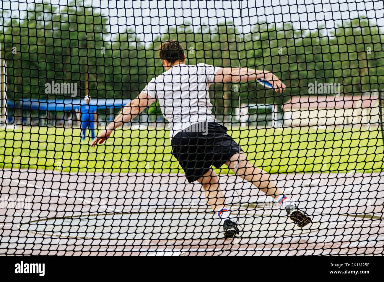 l'atleta maschile tenta di lanciare il discous Foto Stock