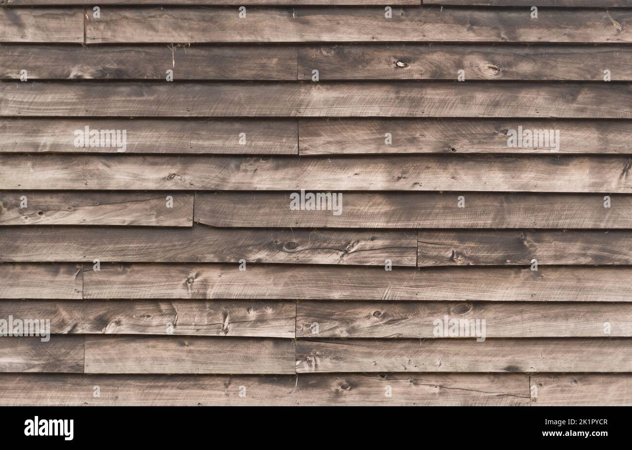 Struttura rustica del rivestimento di legno, orizzontale non verniciato vecchio listelli di legno fondo Foto Stock