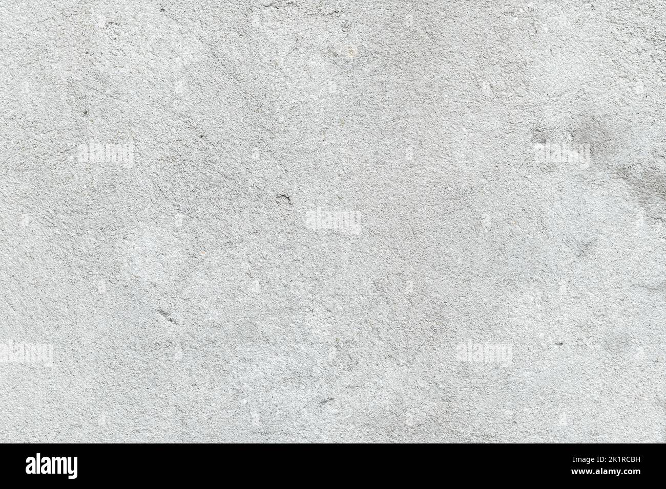 Texture beton grigia, fondo in cemento grigio chiaro, superficie in cemento. Spazio vuoto. Design dello sfondo. Carta da parati grunge naturale, vecchio granito resistente alle intemperie Foto Stock