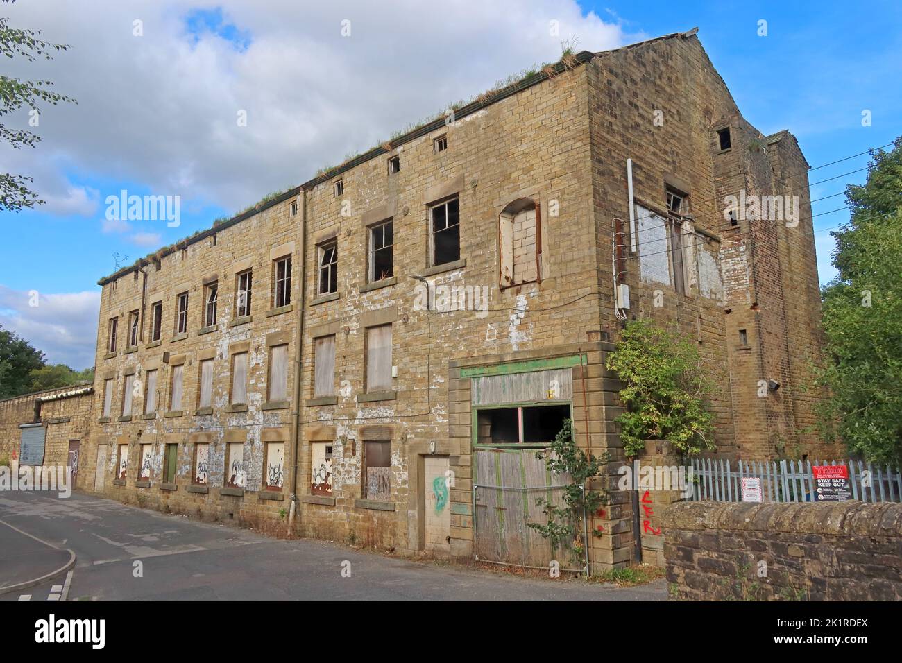 Woods Mill, ex-Volcrepe Limited, Glossop, High Peak, Derbyshire, Inghilterra, Regno Unito, SK13 Foto Stock