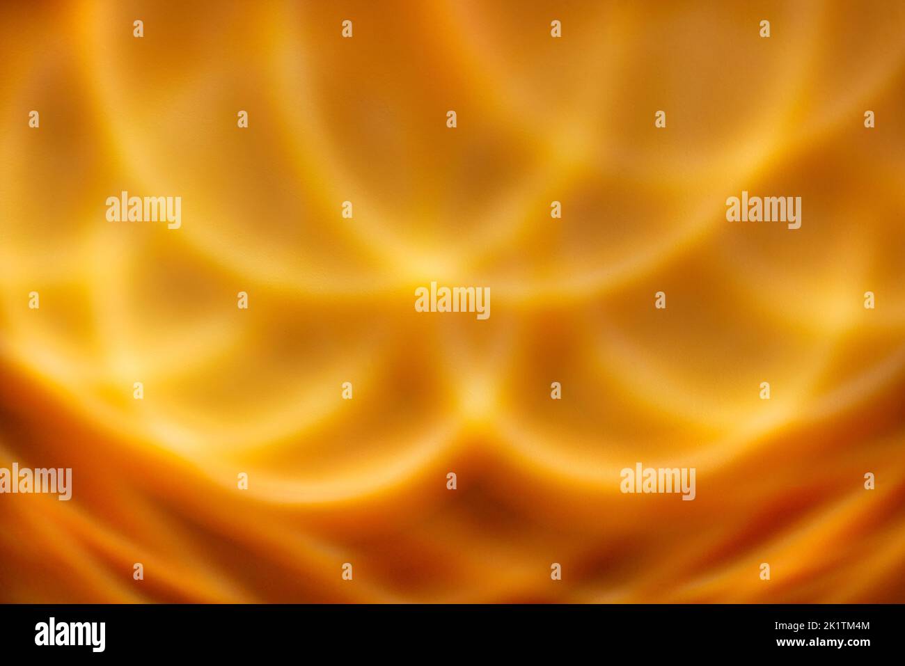 motivo o sfondo astratto arancione ondulato Foto Stock