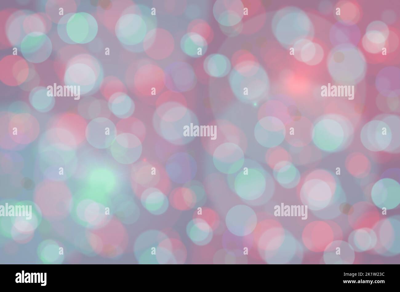 Sfondo tonalità pastello gioiello di macchie di luce bokeh in splendidi colori di sfumature di blu, verde, rosa, viola e molto altro. Foto di sfondo astratta Foto Stock