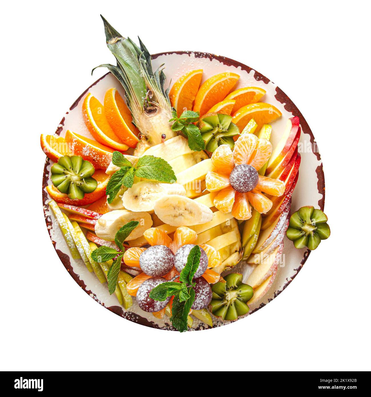 Piatto isolato di frutta a fette assortita Foto Stock