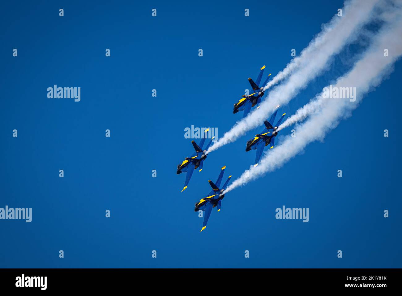 Una splendida vista di quattro aerei da combattimento con fumo in aria Foto Stock
