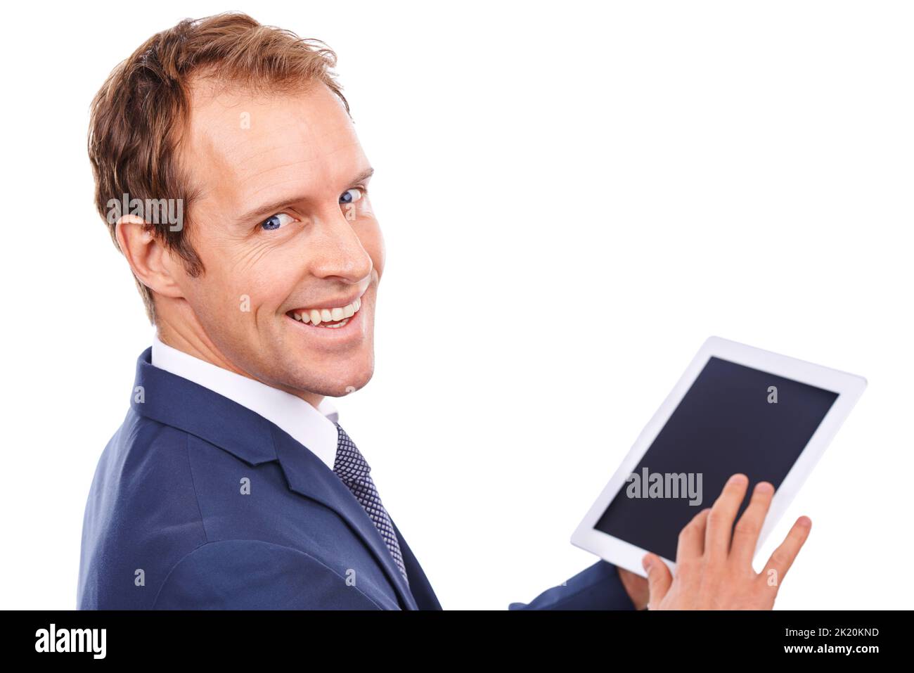 Organizzazione a portata di mano. Un'immagine da studio di un uomo d'affari che utilizza un tablet. Foto Stock