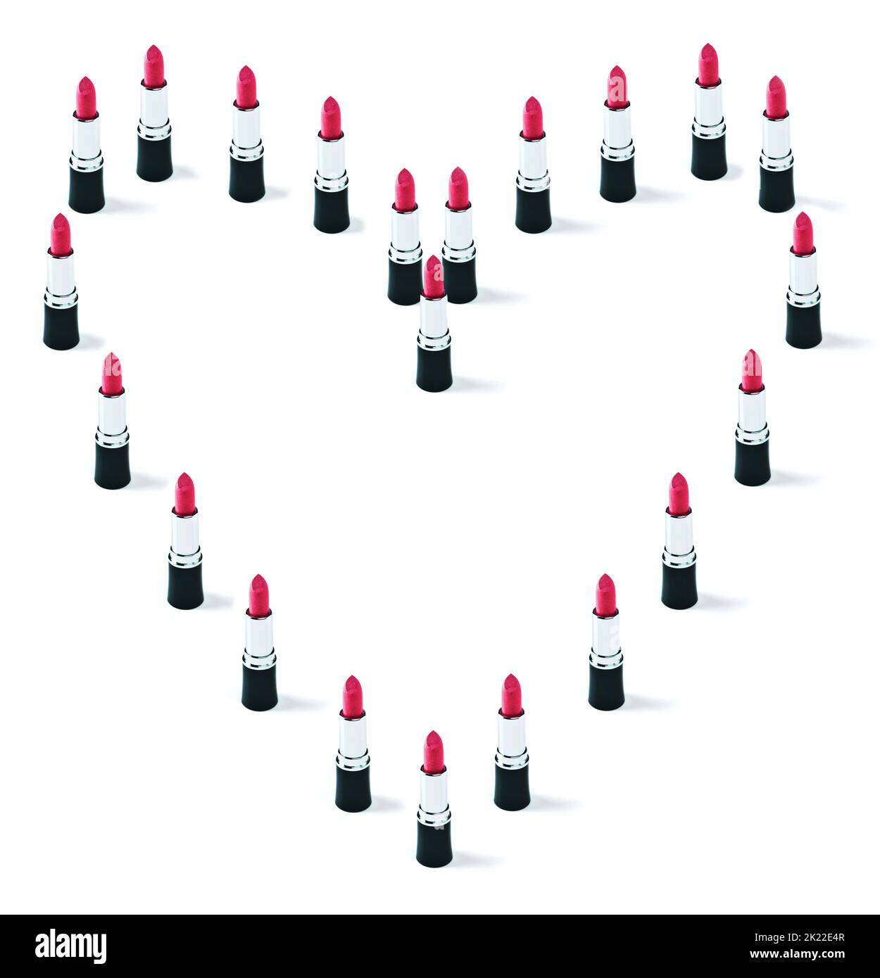 Amate le labbra. Studio shot di rossetti disposti a forma di cuore. Foto Stock