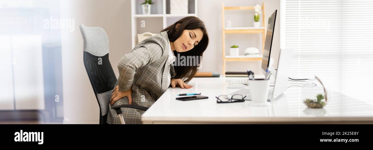 Sedia ergonomica del computer cattiva postura Foto Stock