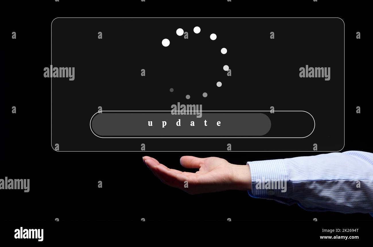 il processo di aggiornamento del programma, sito. Avviare un nuovo business e una mano di una donna su uno sfondo nero Foto Stock