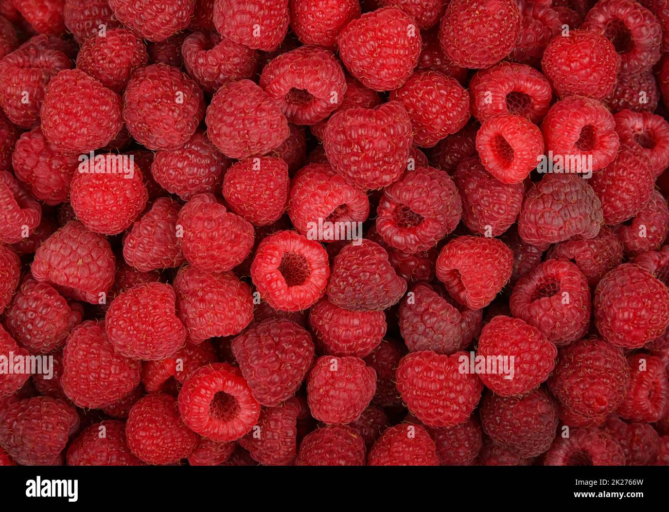 Fondo di lamponi freschi e maturi Foto Stock