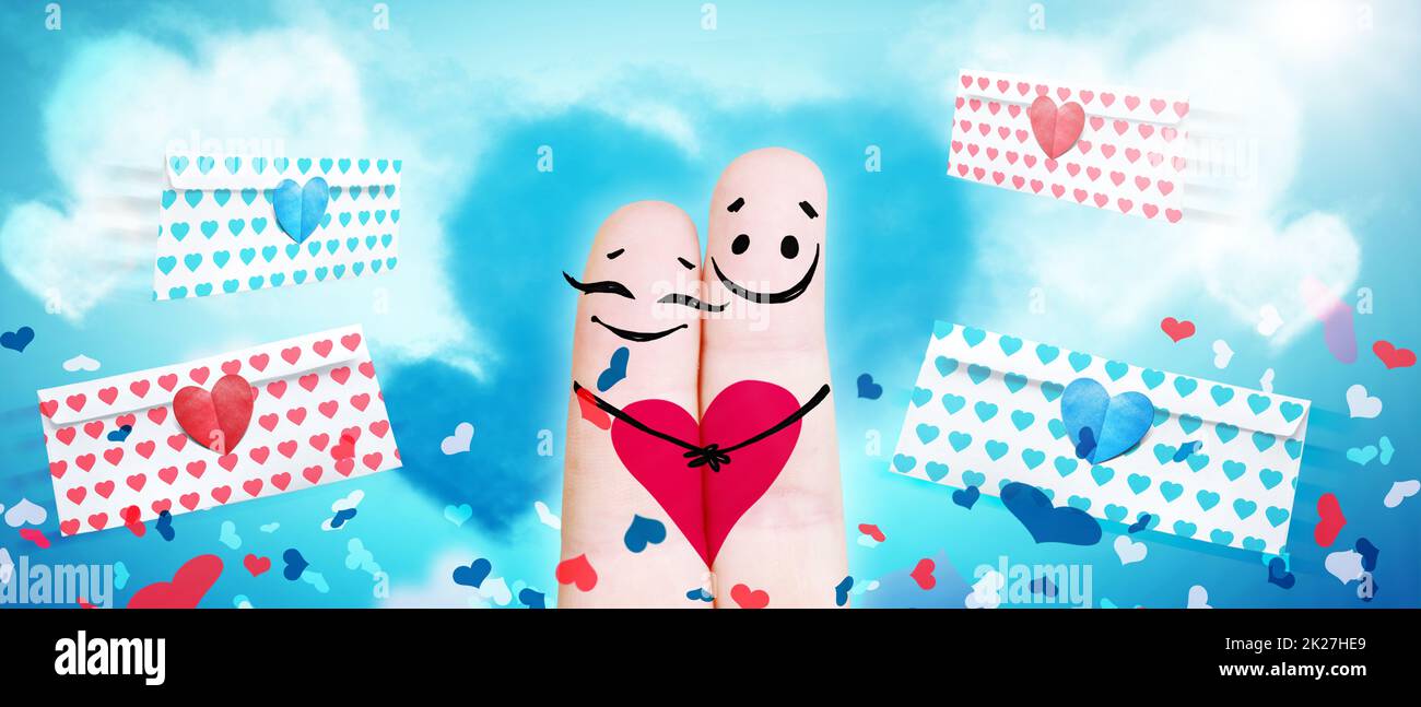 Felice dito giovane in amore per celebrare il giorno di San Valentino Foto Stock