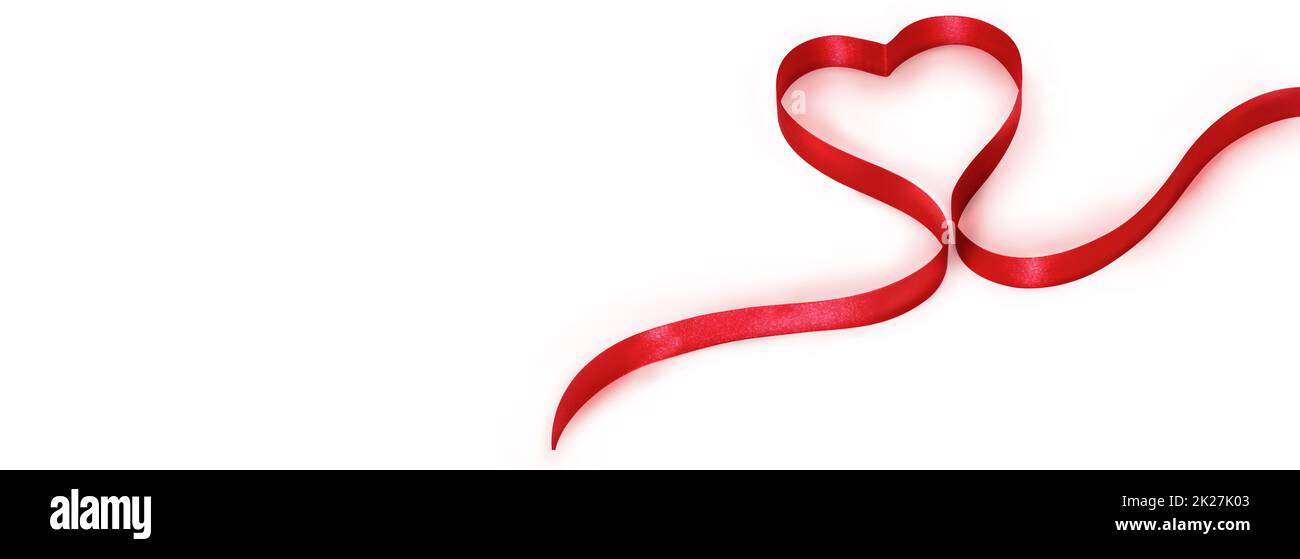 Buon San Valentino. Elegante nastro a forma di cuore. Simbolo dell'amore. Foto Stock