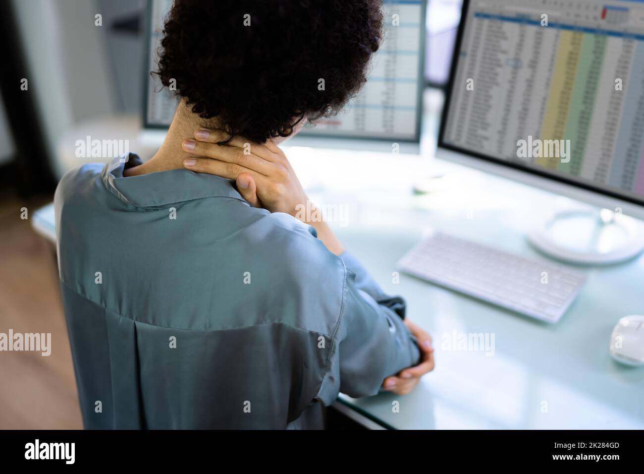 Sedia ergonomica del computer cattiva postura Foto Stock